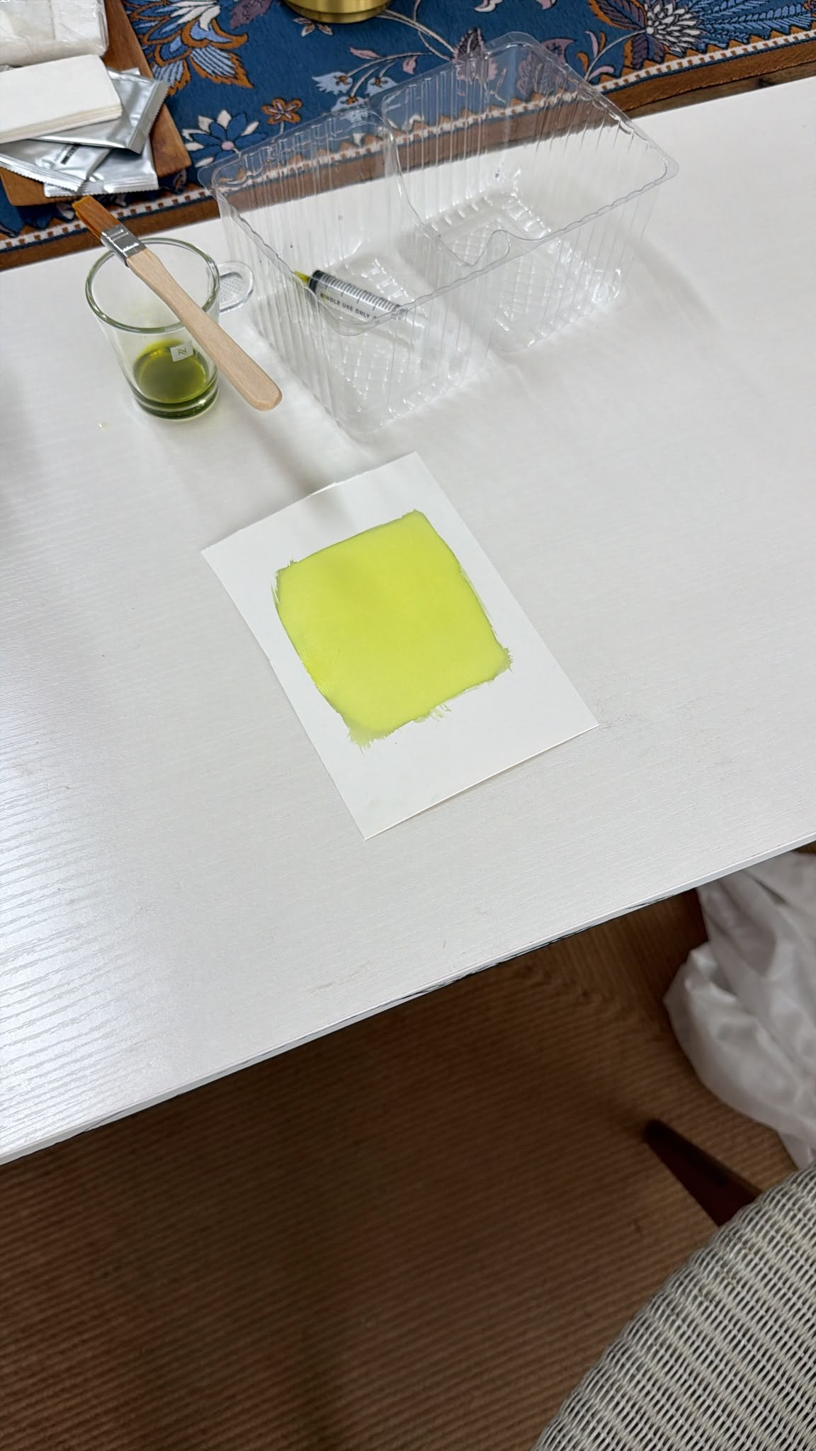 Coating watercolor paper with yellow cyanotype sensitizer — iron salts brushed on before UV exposure